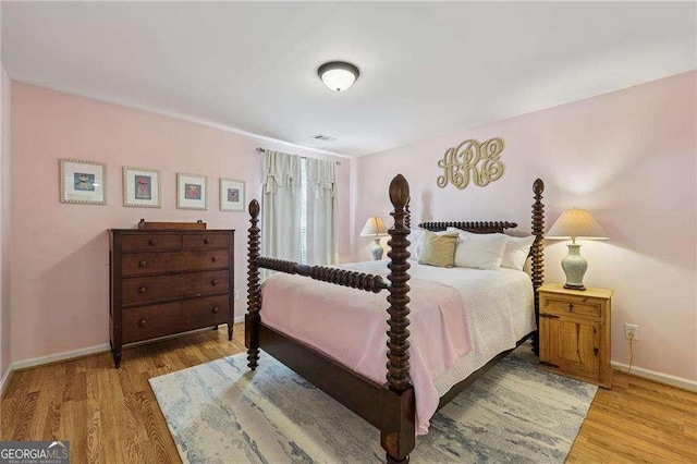 2508 Haddenham Ln SW, Smyrna, GA 30082 - bedroom featuring baseboards and light wood-style flooring