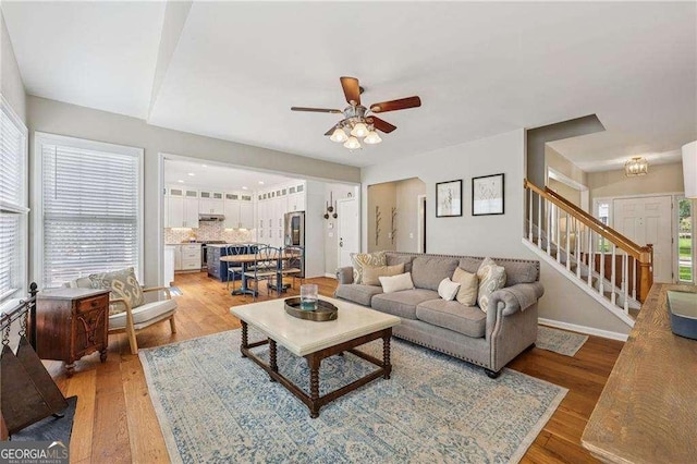 2508 Haddenham Ln SW, Smyrna, GA 30082 - living area with stairs, light wood finished floors, and ceiling fan