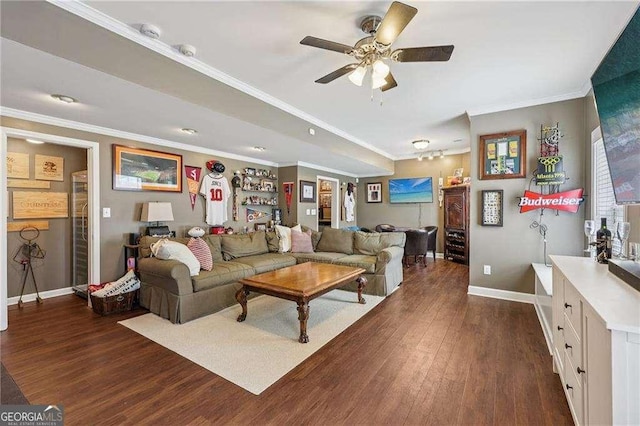 2508 Haddenham Ln SW, Smyrna, GA 30082 - living room featuring dark wood-type flooring, a ceiling fan, and crown molding