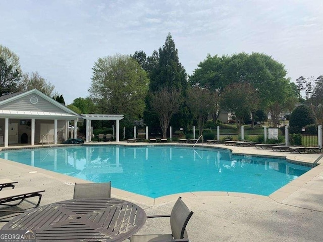 2508 Haddenham Ln SW, Smyrna, GA 30082 - community pool with a pergola and a patio area