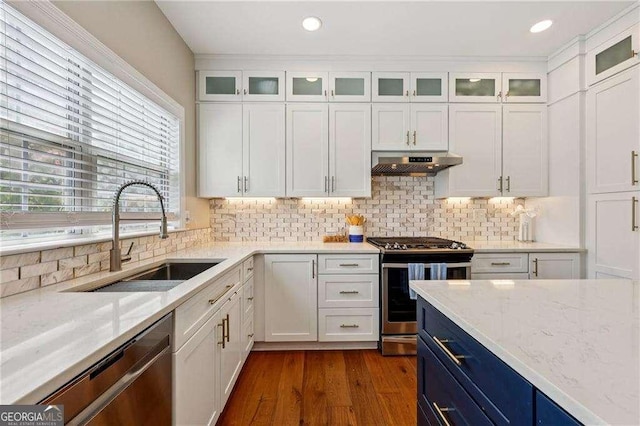 2508 Haddenham Ln SW, Smyrna, GA 30082 - kitchen featuring appliances with stainless steel finishes, under cabinet range hood, white cabinets, and recessed lighting