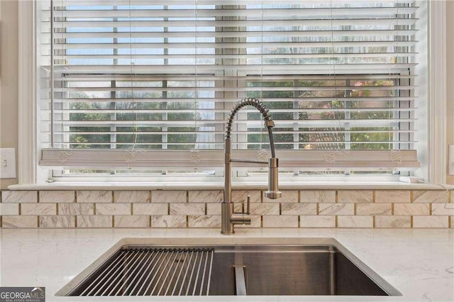 2508 Haddenham Ln SW, Smyrna, GA 30082 - detailed view of decorative backsplash and light stone counters