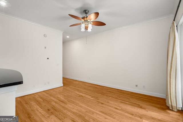 384 Ralph Mcgill Blvd NE Unit 123, Atlanta, GA 30312 - unfurnished room with ornamental molding, ceiling fan, light wood-style floors, and recessed lighting