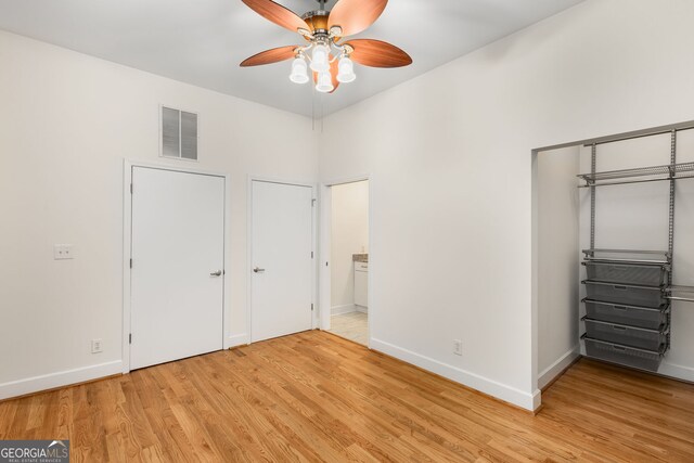 384 Ralph Mcgill Blvd NE Unit 123, Atlanta, GA 30312 - unfurnished bedroom with light wood-type flooring and ceiling fan
