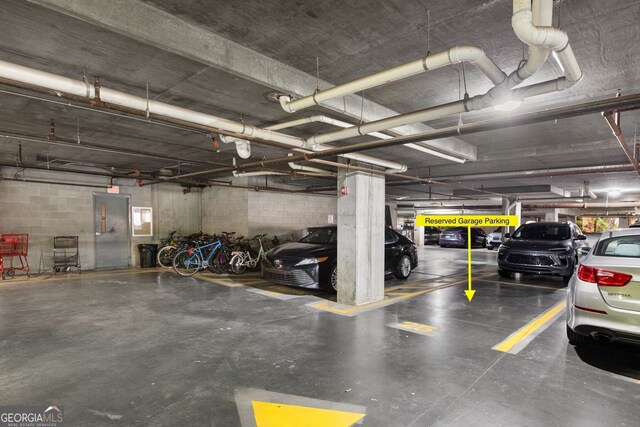 384 Ralph Mcgill Blvd NE Unit 123, Atlanta, GA 30312 - parking garage featuring concrete block wall