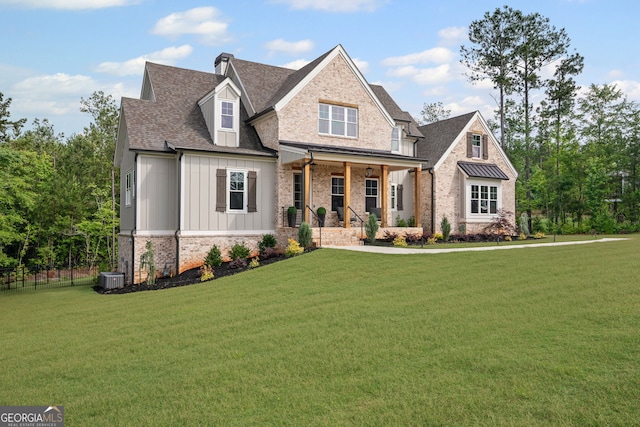 40 Fernbank Way, Newnan, GA 30265 - craftsman house with covered porch, board and batten siding, a shingled roof, and brick siding