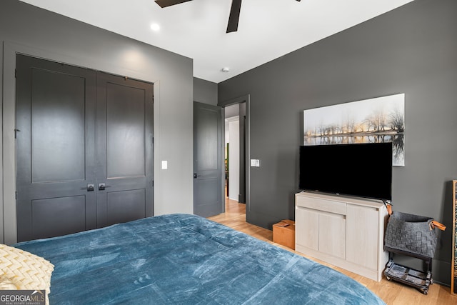 40 Fernbank Way, Newnan, GA 30265 - bedroom with wood finished floors, a closet, and ceiling fan