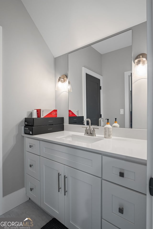40 Fernbank Way, Newnan, GA 30265 - bathroom with vanity and vaulted ceiling