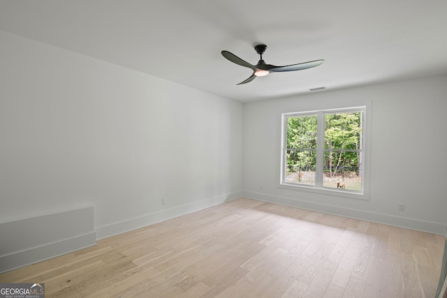 40 Fernbank Way, Newnan, GA 30265 - unfurnished room featuring a ceiling fan and light wood-type flooring