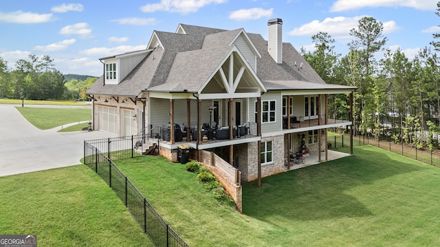 40 Fernbank Way, Newnan, GA 30265 - rear view of house featuring driveway, stone siding, a shingled roof, a fenced backyard, and a chimney