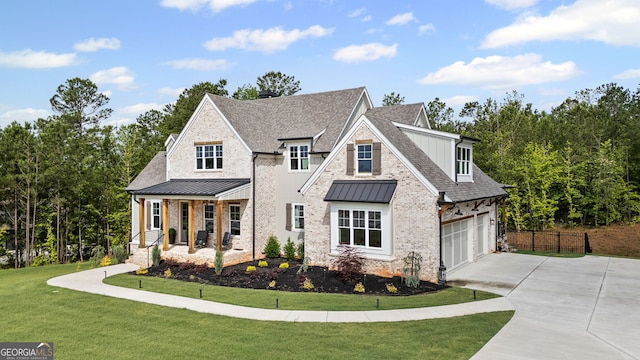 40 Fernbank Way, Newnan, GA 30265 - view of front of property with driveway, roof with shingles, a standing seam roof, and covered porch