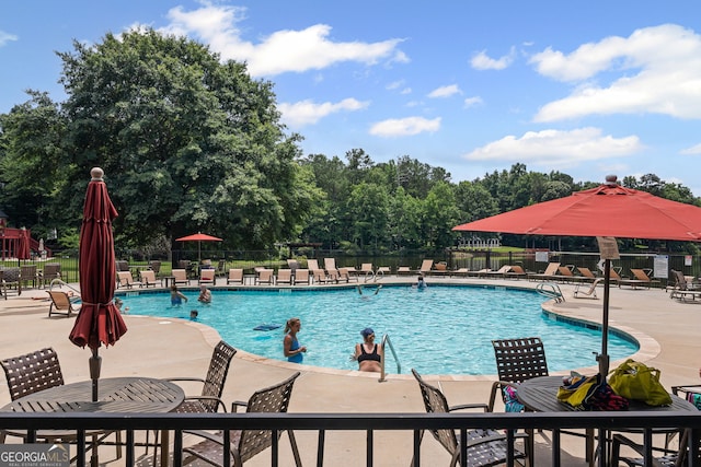 40 Fernbank Way, Newnan, GA 30265 - community pool with a patio area and view of wooded area