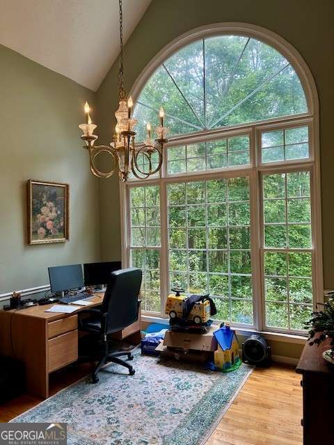 370 Butler Path, Dallas, GA 30132 - office with wood finished floors, lofted ceiling, and a chandelier