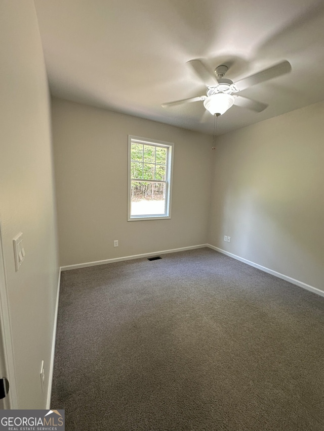 48 Narrow Ln, Dahlonega, GA 30533 - empty room featuring ceiling fan and dark carpet