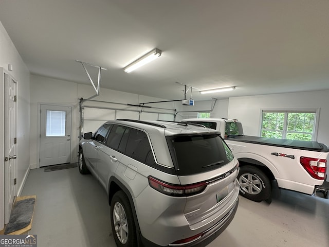 48 Narrow Ln, Dahlonega, GA 30533 - garage featuring a garage door opener