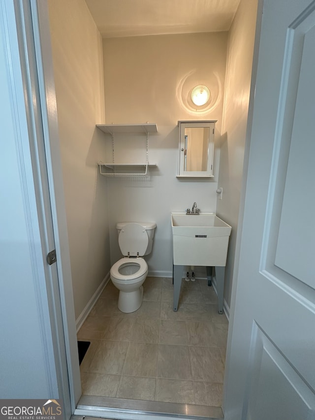 48 Narrow Ln, Dahlonega, GA 30533 - bathroom with baseboards and tile patterned flooring