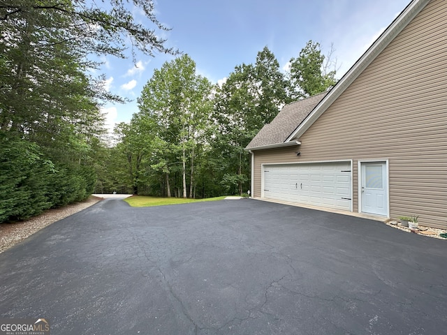 48 Narrow Ln, Dahlonega, GA 30533 - garage featuring driveway