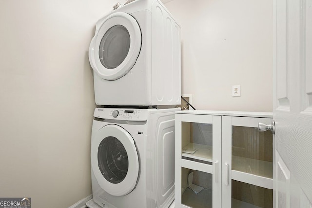 3366 English Oaks Dr NW, Kennesaw, GA 30144 - laundry area featuring stacked washer and clothes dryer