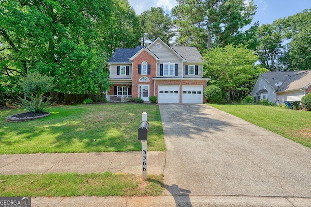 3366 English Oaks Dr NW, Kennesaw, GA 30144 - view of front of property with brick siding, driveway, an attached garage, covered porch, and a front yard
