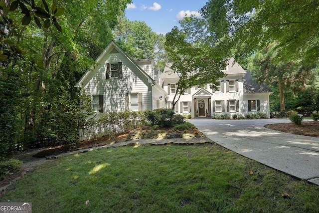 15305 Highgrove Rd, Milton, GA 30004 - view of front of house with a front yard and driveway