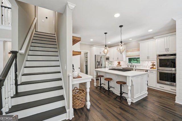 15305 Highgrove Rd, Milton, GA 30004 - kitchen with stainless steel appliances, white cabinets, light countertops, decorative backsplash, and recessed lighting