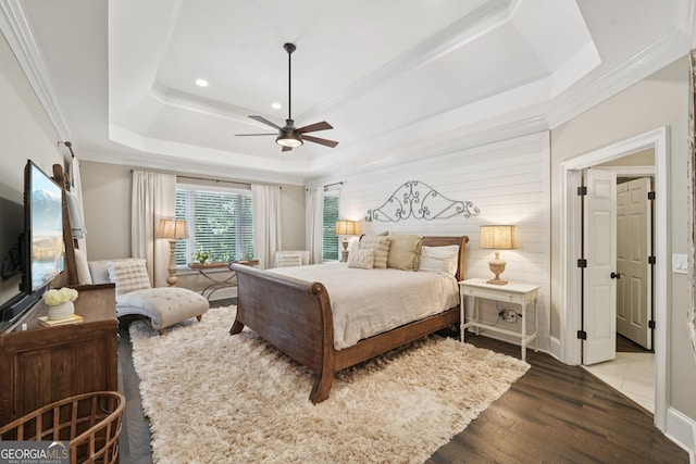 15305 Highgrove Rd, Milton, GA 30004 - bedroom featuring a tray ceiling, wood finished floors, recessed lighting, ornamental molding, and ceiling fan