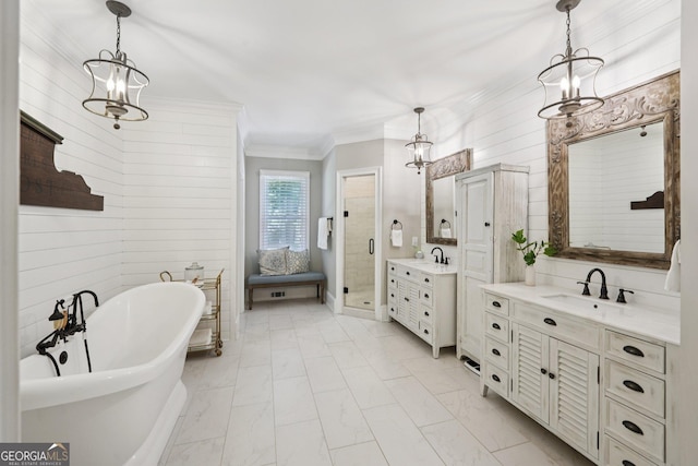 15305 Highgrove Rd, Milton, GA 30004 - full bathroom featuring two vanities, a freestanding bath, a stall shower, marble look tiles, and wooden walls