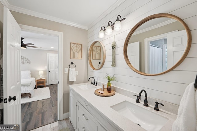 15305 Highgrove Rd, Milton, GA 30004 - full bath featuring connected bathroom, wood finished floors, ornamental molding, double vanity, and a ceiling fan