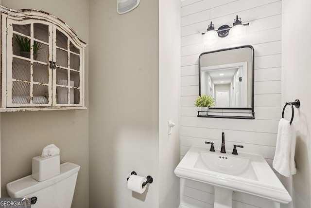 15305 Highgrove Rd, Milton, GA 30004 - half bathroom with toilet and wooden walls
