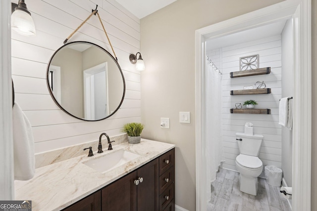 15305 Highgrove Rd, Milton, GA 30004 - full bathroom with vanity and wood finished floors