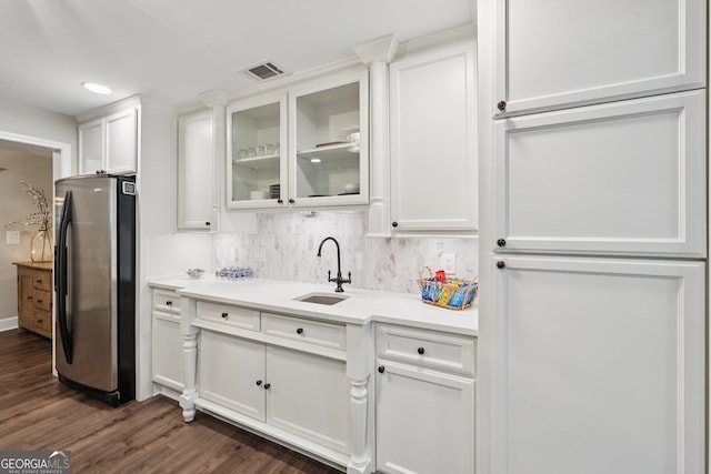 15305 Highgrove Rd, Milton, GA 30004 - kitchen featuring freestanding refrigerator, white cabinetry, decorative backsplash, dark wood finished floors, and light countertops