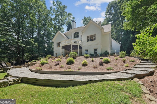 15305 Highgrove Rd, Milton, GA 30004 - rear view of house featuring a chimney