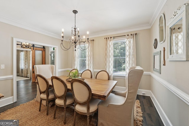 15305 Highgrove Rd, Milton, GA 30004 - dining room with a barn door, a chandelier, dark wood-style flooring, and crown molding