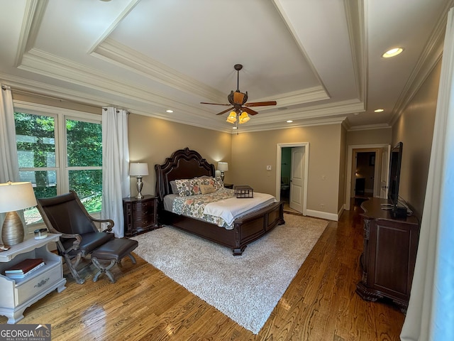 286 Timberlake Dr, Martin, GA 30557 - bedroom with a tray ceiling, light wood-type flooring, crown molding, and ceiling fan