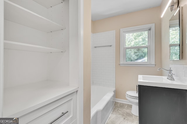 1131 Forrest Blvd, Decatur, GA 30030 - bathroom featuring vanity, healthy amount of natural light, bathing tub / shower combination, and marble look tile flooring