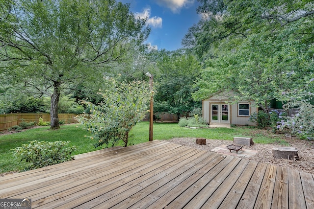 1131 Forrest Blvd, Decatur, GA 30030 - wooden terrace with a fenced backyard, french doors, and an outdoor structure