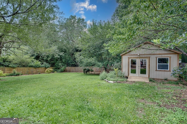 1131 Forrest Blvd, Decatur, GA 30030 - fenced backyard featuring an outdoor structure