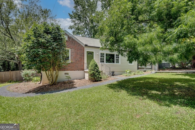 1131 Forrest Blvd, Decatur, GA 30030 - view of property hidden behind natural elements with brick siding and crawl space