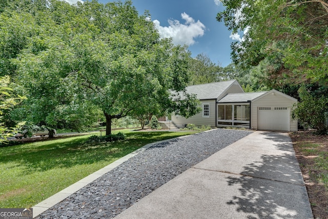 1131 Forrest Blvd, Decatur, GA 30030 - view of front of house with driveway, an attached garage, a front lawn, and a shingled roof