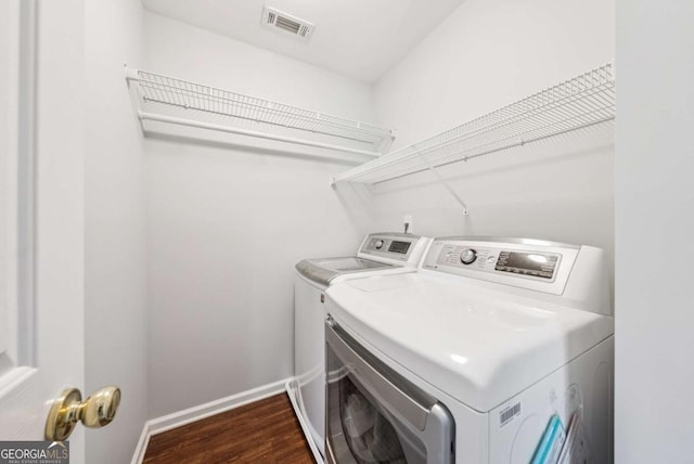 9320 Old Preserve Trl, Ball Ground, GA 30107 - washroom with washer and dryer and dark wood finished floors