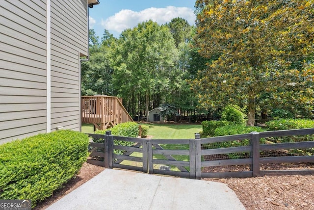 9320 Old Preserve Trl, Ball Ground, GA 30107 - gate featuring a deck and an outdoor structure