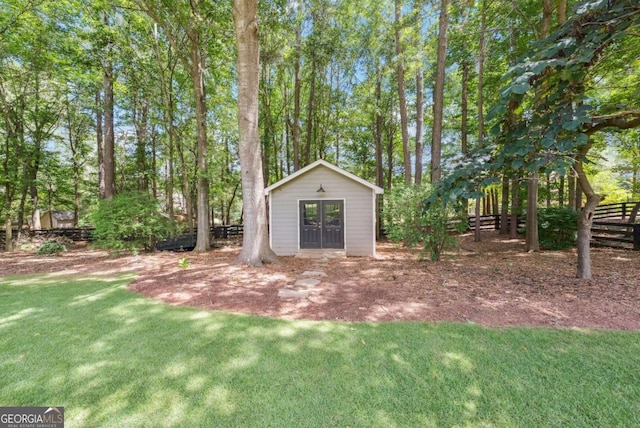 9320 Old Preserve Trl, Ball Ground, GA 30107 - view of yard featuring french doors and an outdoor structure