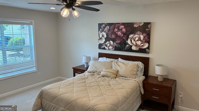 3066 Gem Creek Rd, Buford, GA 30519 - carpeted bedroom featuring baseboards and a ceiling fan