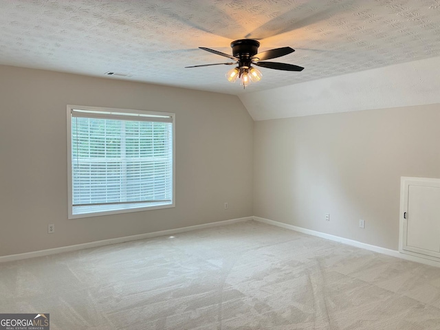 3066 Gem Creek Rd, Buford, GA 30519 - empty room with a ceiling fan, light carpet, a textured ceiling, and lofted ceiling
