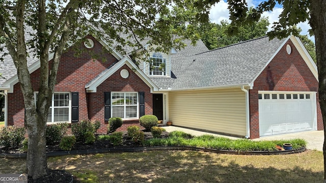 3066 Gem Creek Rd, Buford, GA 30519 - view of front facade featuring an attached garage, brick siding, a shingled roof, and concrete driveway