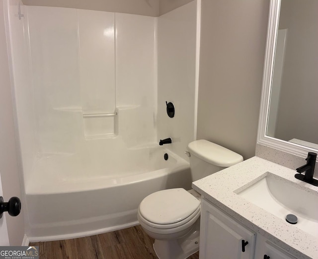 3066 Gem Creek Rd, Buford, GA 30519 - bathroom featuring wood finished floors, vanity, and shower / tub combination