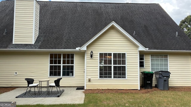 3066 Gem Creek Rd, Buford, GA 30519 - rear view of house with a patio area, roof with shingles, and a chimney