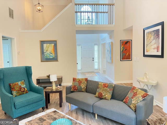 3066 Gem Creek Rd, Buford, GA 30519 - living room with a high ceiling and wood finished floors