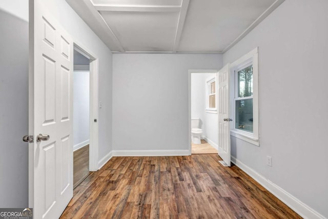 1747 Parkhill Dr, Decatur, GA 30032 - unfurnished bedroom featuring wood finished floors and ensuite bathroom