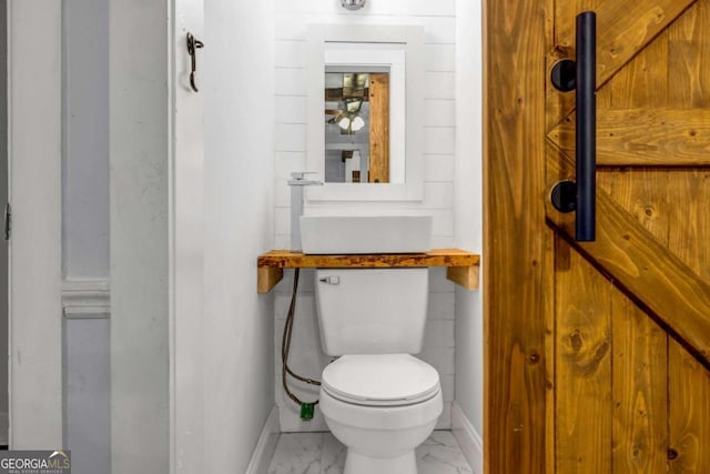 1747 Parkhill Dr, Decatur, GA 30032 - bathroom featuring baseboards and marble finish flooring